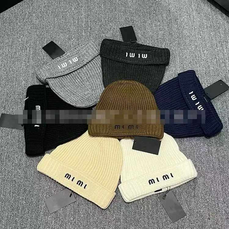 Source listing image for Miu Miu Letter-Embroidered Beanie, item 7726285689
